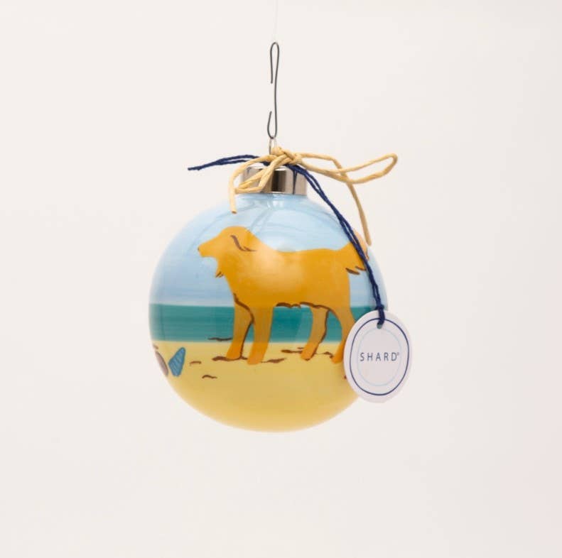 Yellow Dog on Beach Ornament